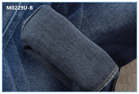 Obscuridade super da tela das calças de brim de Lycra do algodão do toque macio - azul