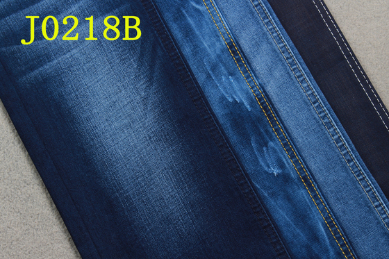 Tela da sarja de Nimes 9OZ com descolagem azul da parte traseira do Spandex do poliéster do algodão de Tencel 3/1 de sarja do assistente