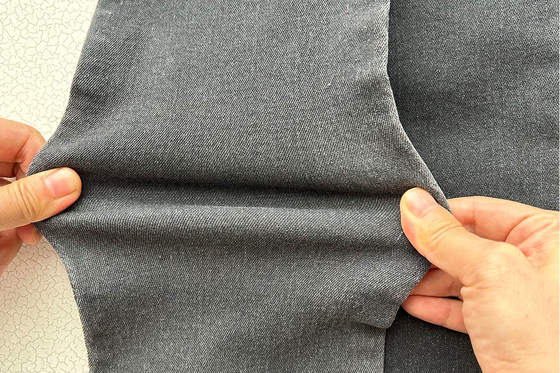 10 oz preço competitivo preço acentuado cor cinza para o homem Jean estiramento denim tecido da fábrica da China