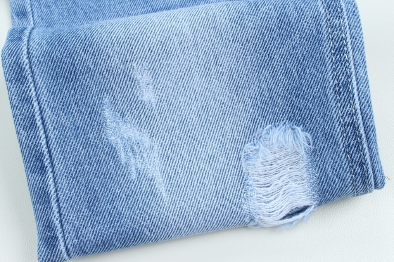 Varejo por grosso 7000 metros Stock 10,5 oz 100% algodão rígido jeans tecido