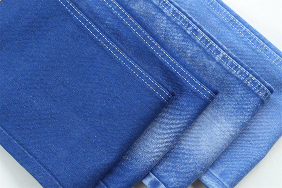 Vibrante e de cor azul única Tecido denim rígido 100% algodão Largura total 180cm