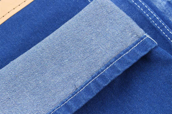 Vibrante e de cor azul única Tecido denim rígido 100% algodão Largura total 180cm