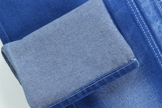 Vibrante e de cor azul única Tecido denim rígido 100% algodão Largura total 180cm