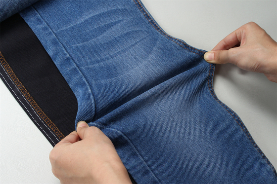 Tecido Denim de Alta Elasticidade Adequado para Mulheres 11.4 oz Peso Médio TR Tecido Denim Com Característico de Lobo