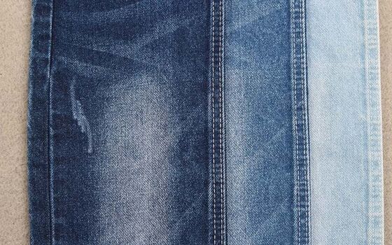 Tecido de denim de algodão 100% de alta qualidade. Denim pesado clássico para casaco de jeans.