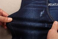 Sarja magro do assistente das calças de brim RHT das mulheres azuis Stretchable enormes tela da sarja de Nimes de 10 onças