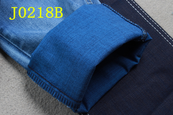 Tela da sarja de Nimes 9OZ com descolagem azul da parte traseira do Spandex do poliéster do algodão de Tencel 3/1 de sarja do assistente