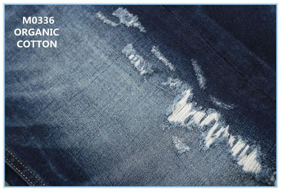 Bom preço O meio agradável de um estiramento de 10,5 onças torna mais pesada a tela orgânica da sarja de Nimes para calças de brim dos homens on-line